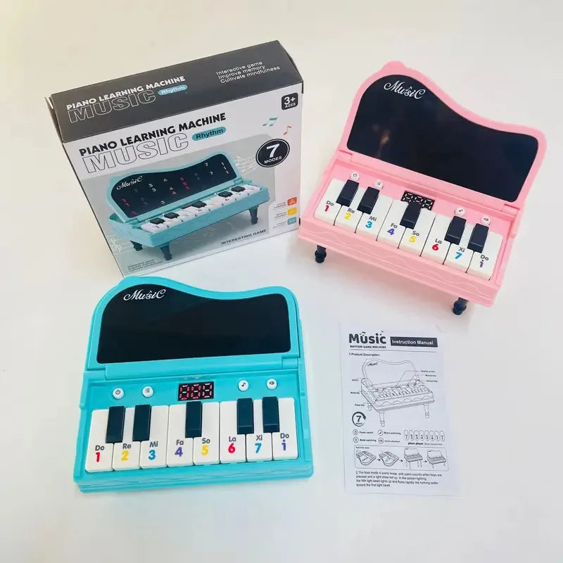 A handheld mini desktop piano with lights, music, electronic keyboard rhythm, and a game console for completing levels; a Montes